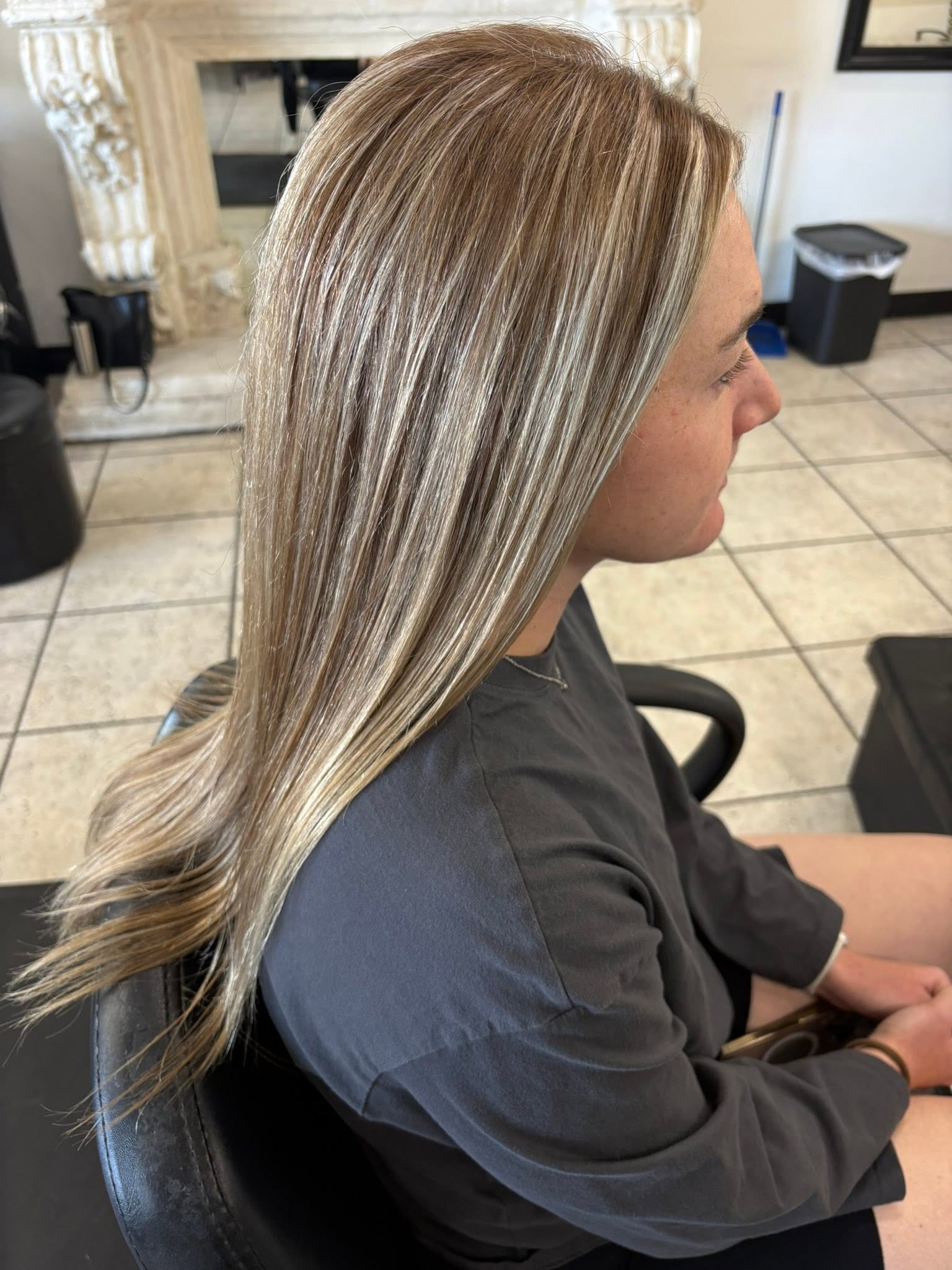 Dimensional highlights and polished long hair by Heidi Mancini